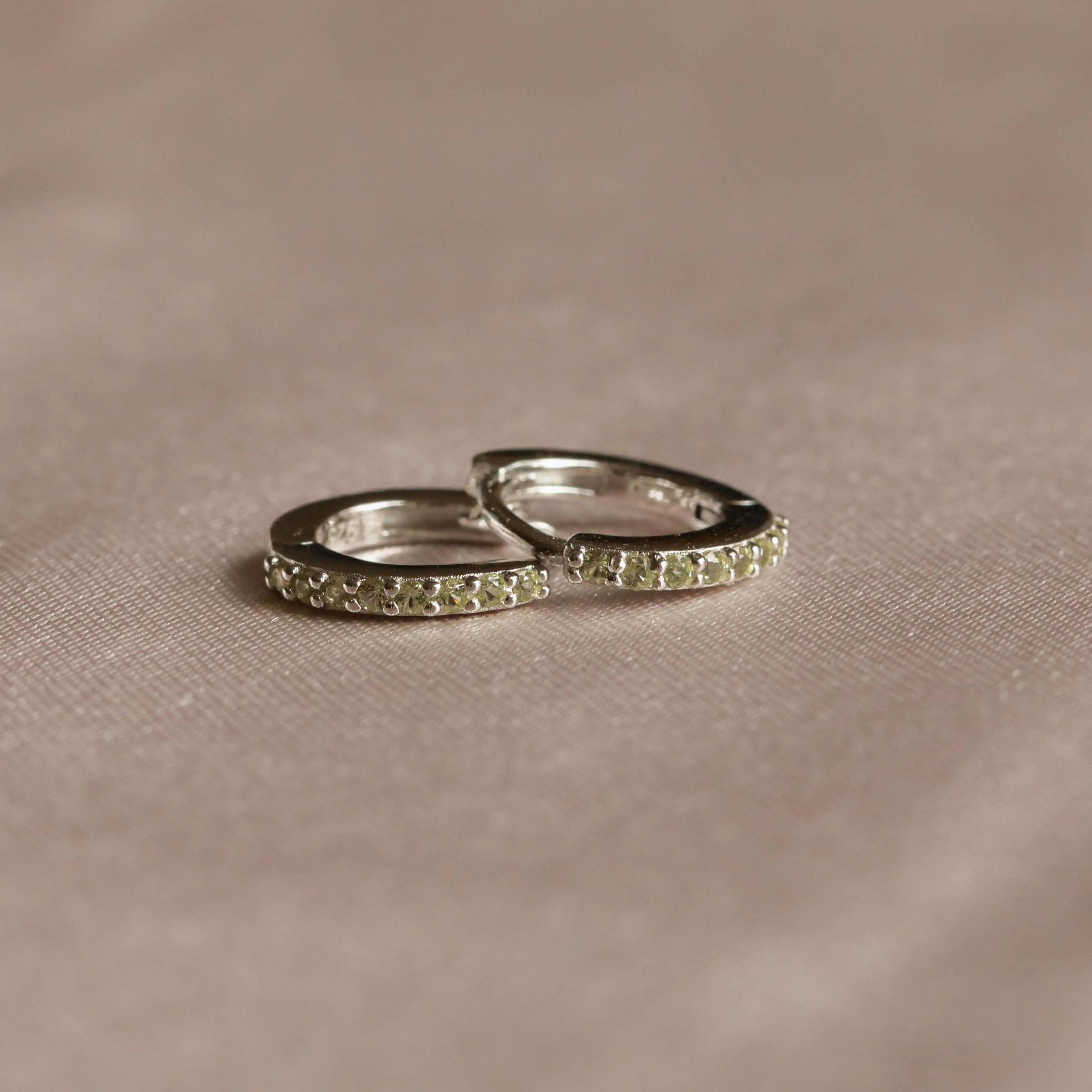 August Birthstone Huggies in Silver with Peridot CZ - Image 3
