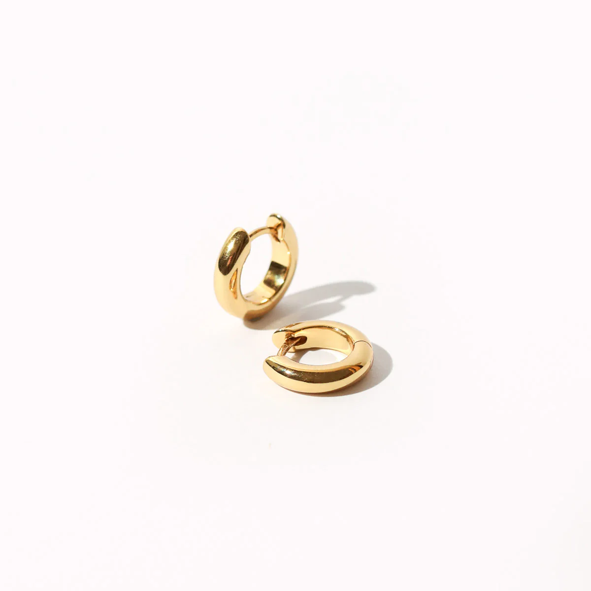 Bold Small Hoops in Gold - Image 3