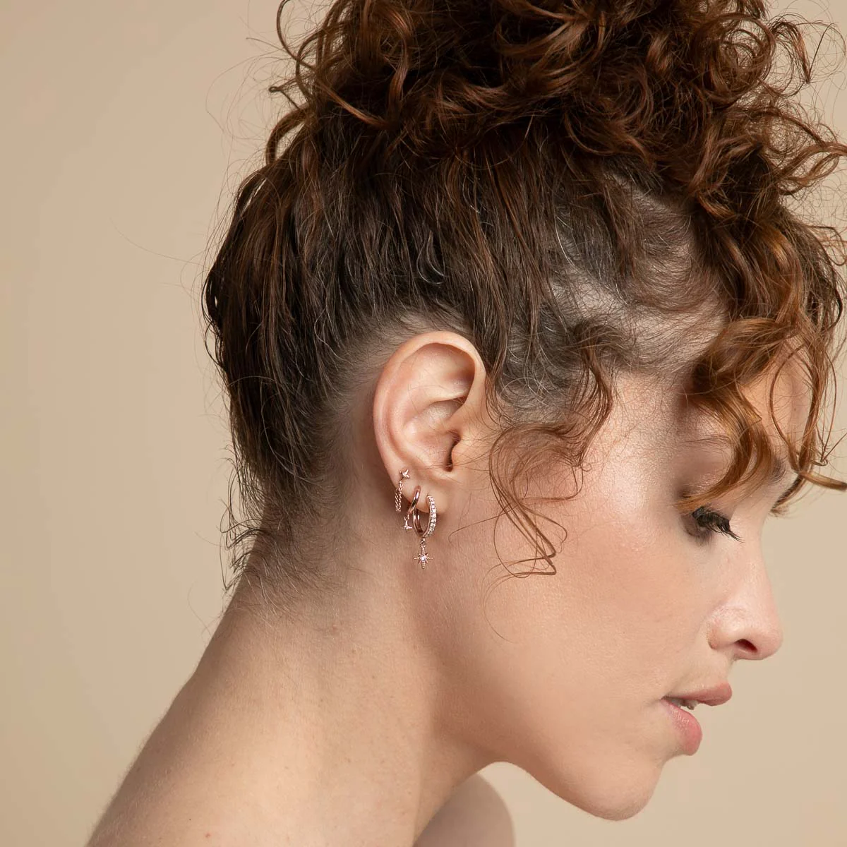 Cosmic Star Chain Stud Earrings in Rose Gold - Image 4