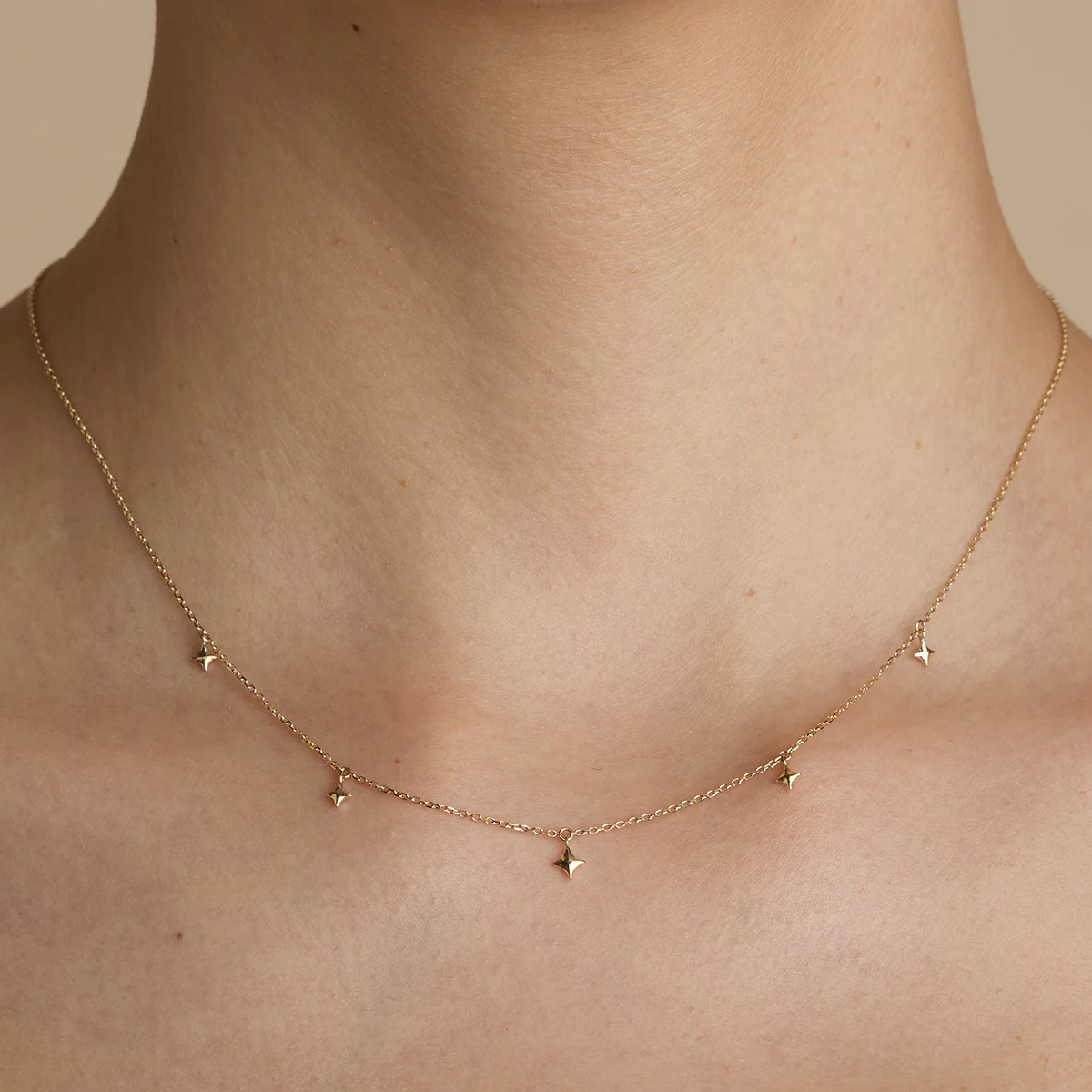Cosmic Star Charm Necklace in Solid Gold - Image 2