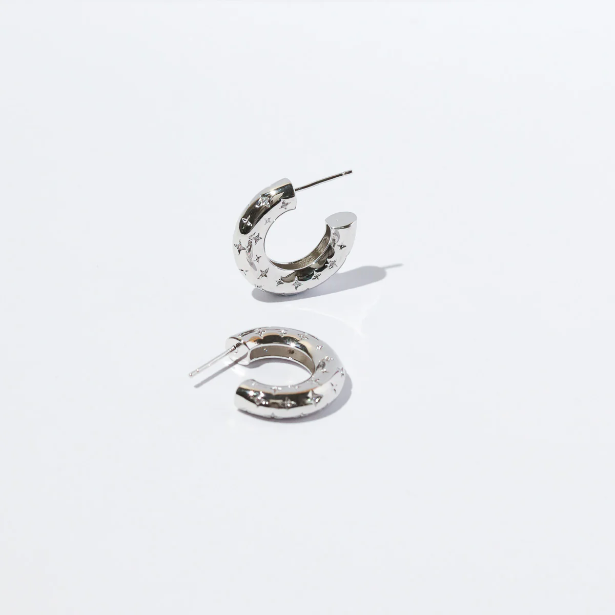 Cosmic Star Dome Hoops in Silver - Image 4