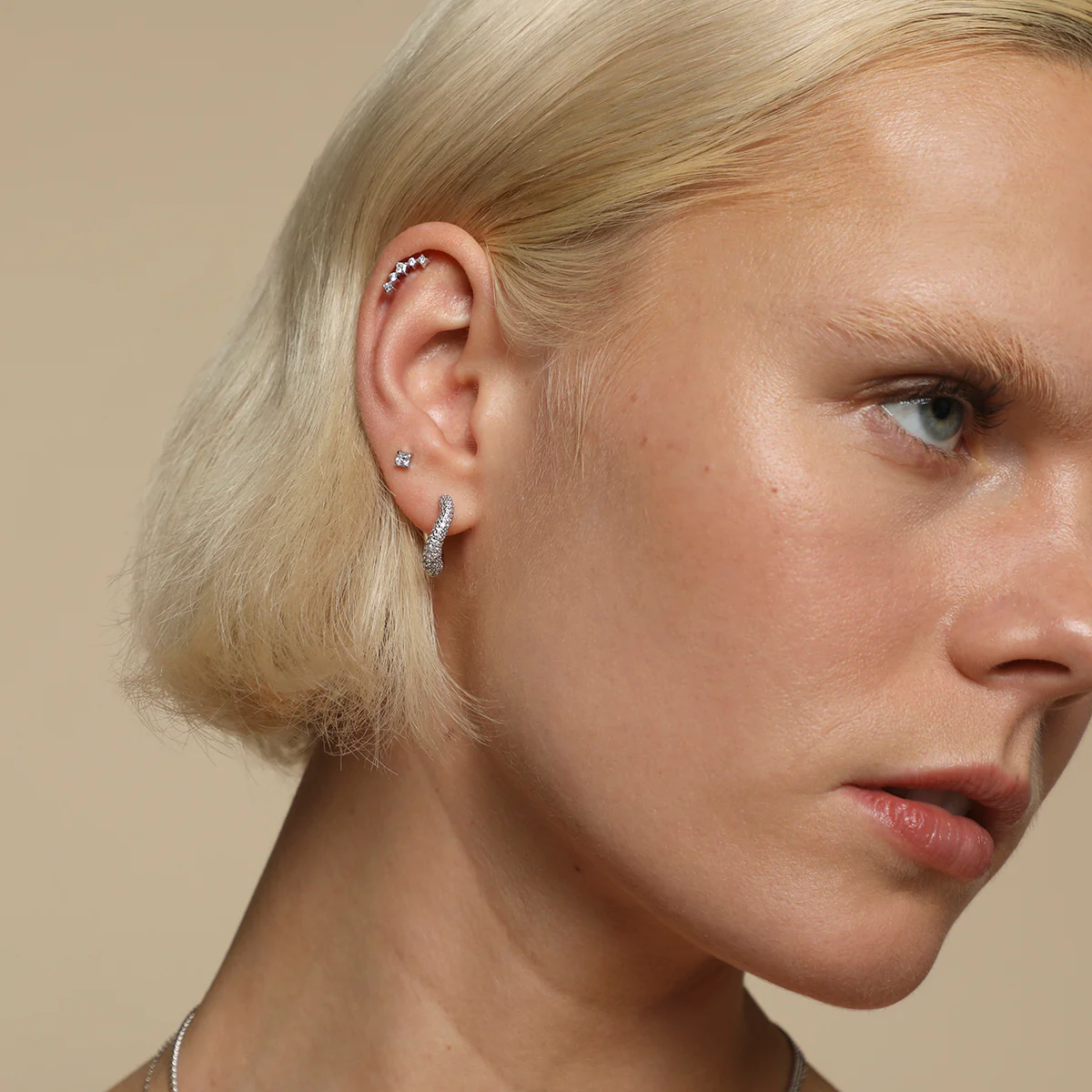 Curved Square Crystal Titanium Piercing Stud in Platinum - Image 4