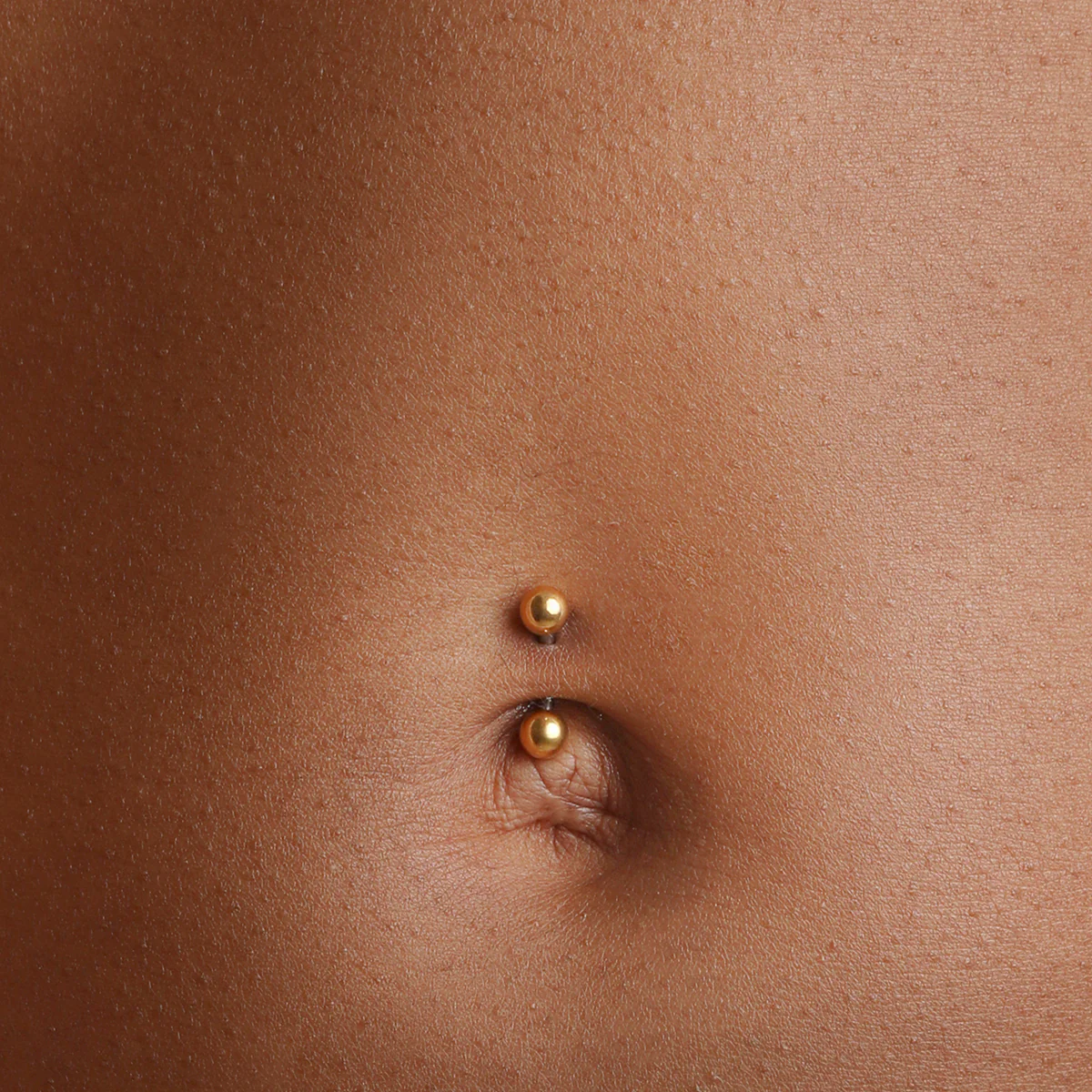 Essential Ball Titanium Belly Bar in Gold - Image 4