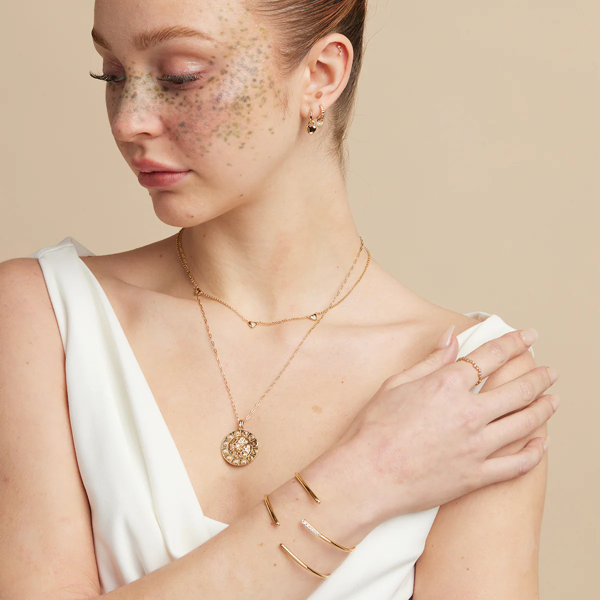 Heart Charm Huggies in Gold - Image 5