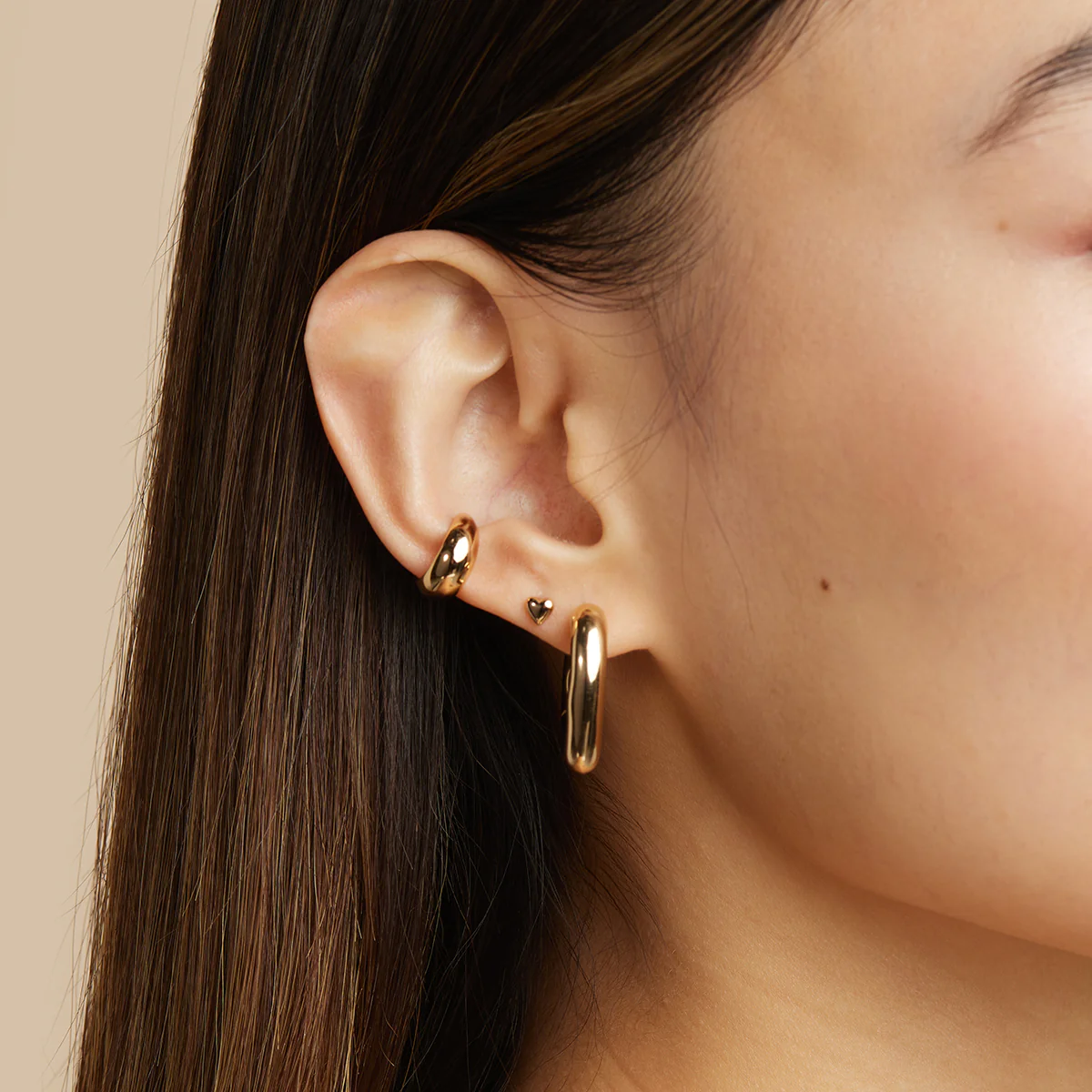 Heart Stud Earrings in Gold - Image 2