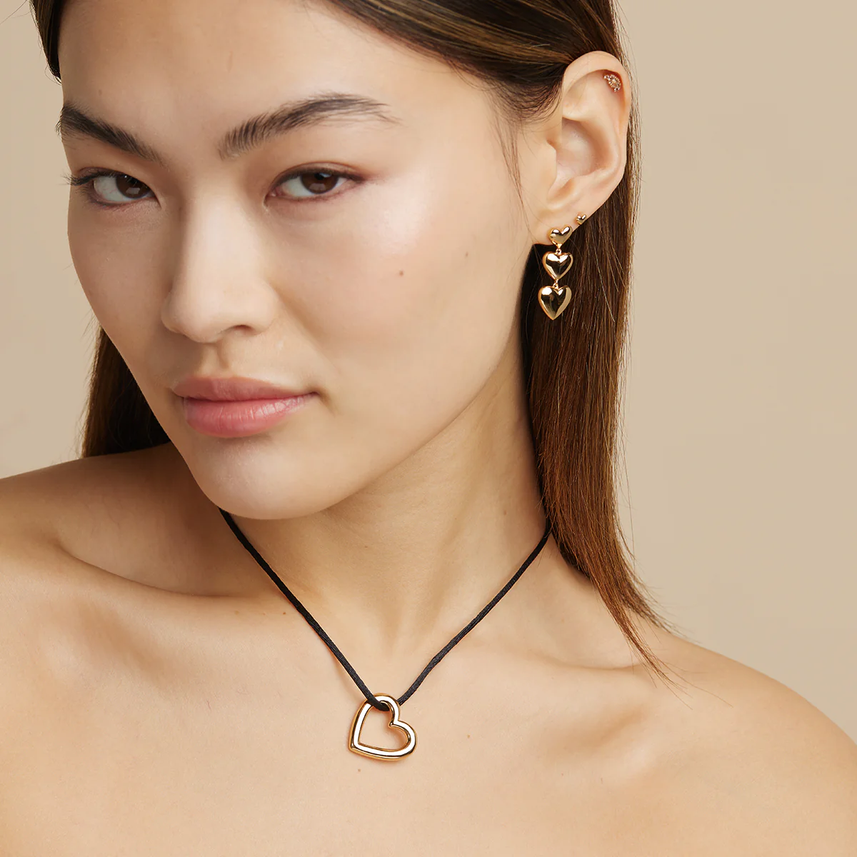 Heart Stud Earrings in Gold - Image 5
