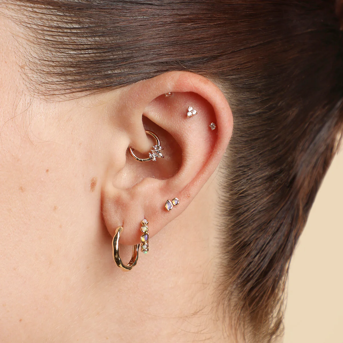 Opal Pear Bezel Huggies in Solid Gold - Image 3