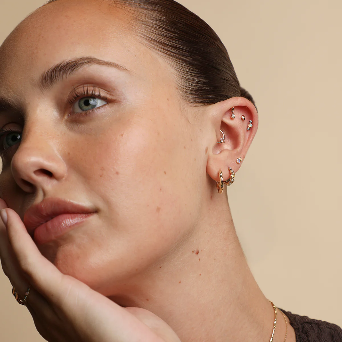 Opal Pear Bezel Huggies in Solid Gold - Image 4